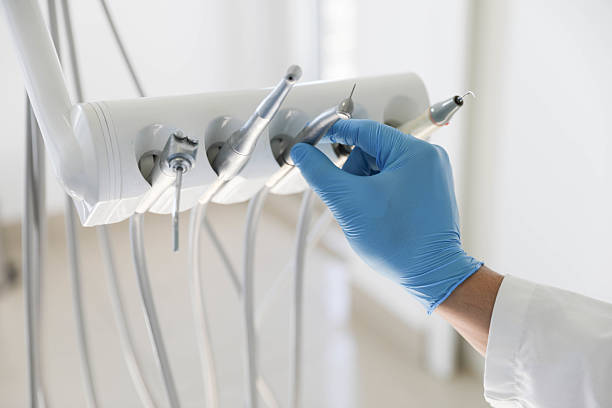 Professional Tooth Extraction technician working in River Oaks, TX